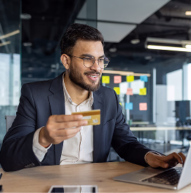 Sales executive reviewing deals at his desk